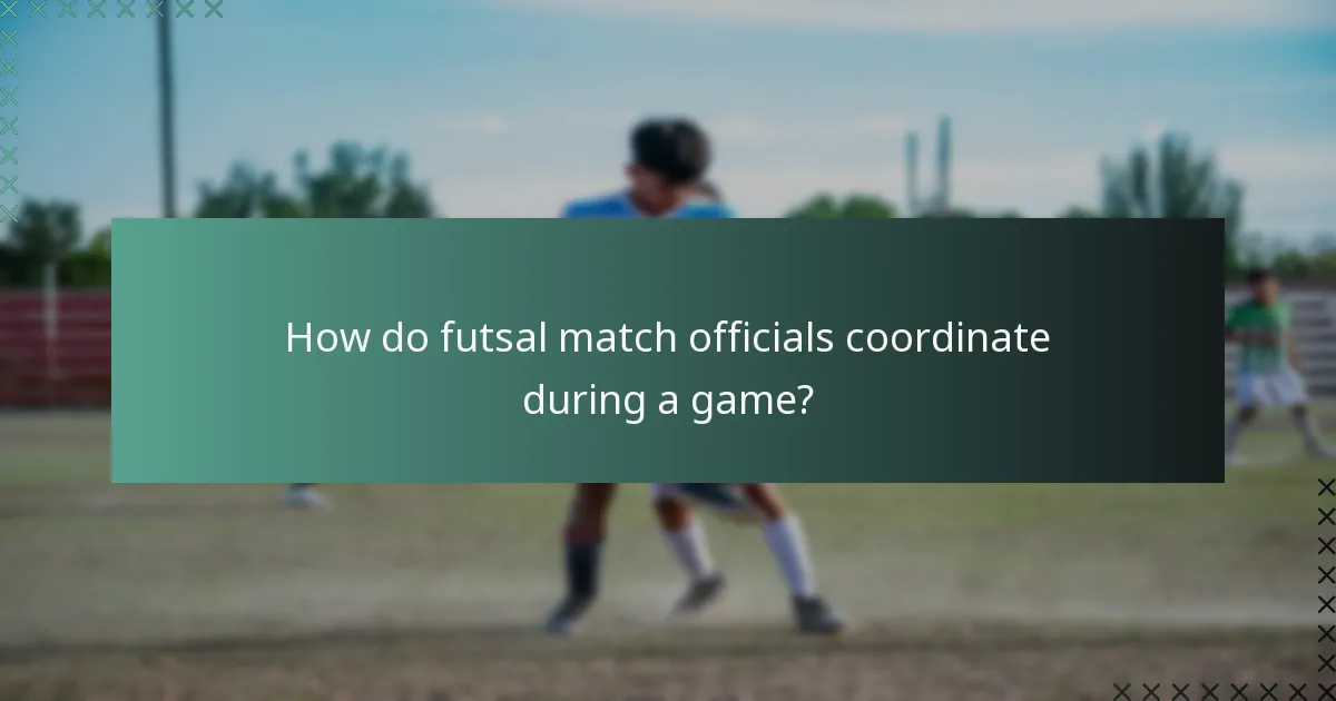 How do futsal match officials coordinate during a game?