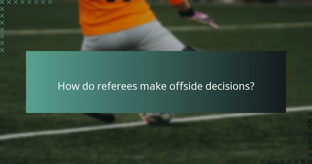 How do referees make offside decisions?